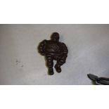 Cast iron Michelin Man ornament