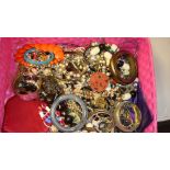 Tin of assorted costume jewellery