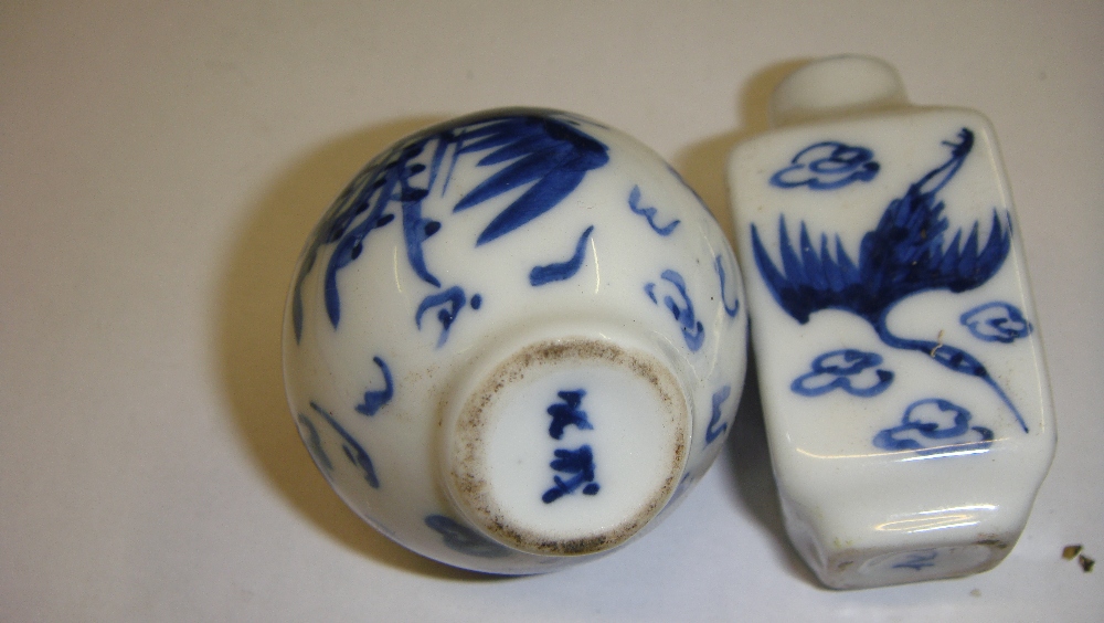 2 x Chinese blue and white snuff bottles