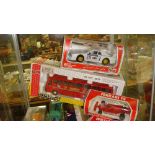 Shelf of assorted toy cars including Joal Bus (boxed not mint)