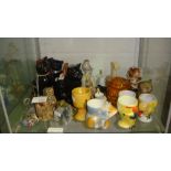 2 x shelves of decorative animal ornaments, egg cups, pickle jars etc.