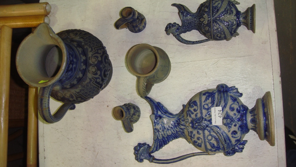 Assorted early 20th century German salt glaze jugs and ewers