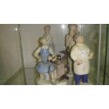 Assorted decorative figurines : Cobbler, Blacksmith etc.