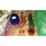 Assorted coloured and clear glassware including cranberry and ruby glass ware