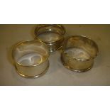 3 x silver serviette rings differing makers,