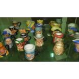 Shelf of miniature character jugs