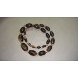 Vintage graduated Chinese horn beads