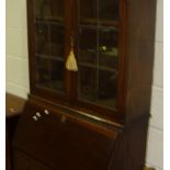 Early 20th century oak leaded and glazed bureau bookcase