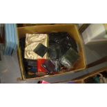 Box of purses and handbags,