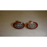 Pair of South East Asian silver and enamel cufflinks