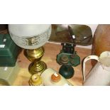 Scales, paraffin lamp, hot water bottle, stoneware advertising bottle North & Co Oxford,