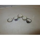 5 x assorted silver and other paste hardstone rings