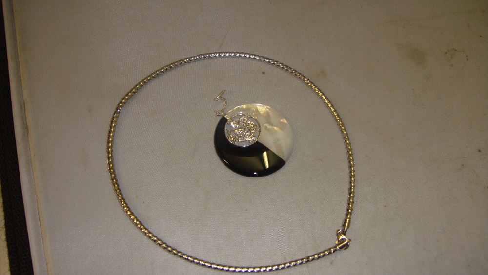 Modern necklace with mother of pearl pendant