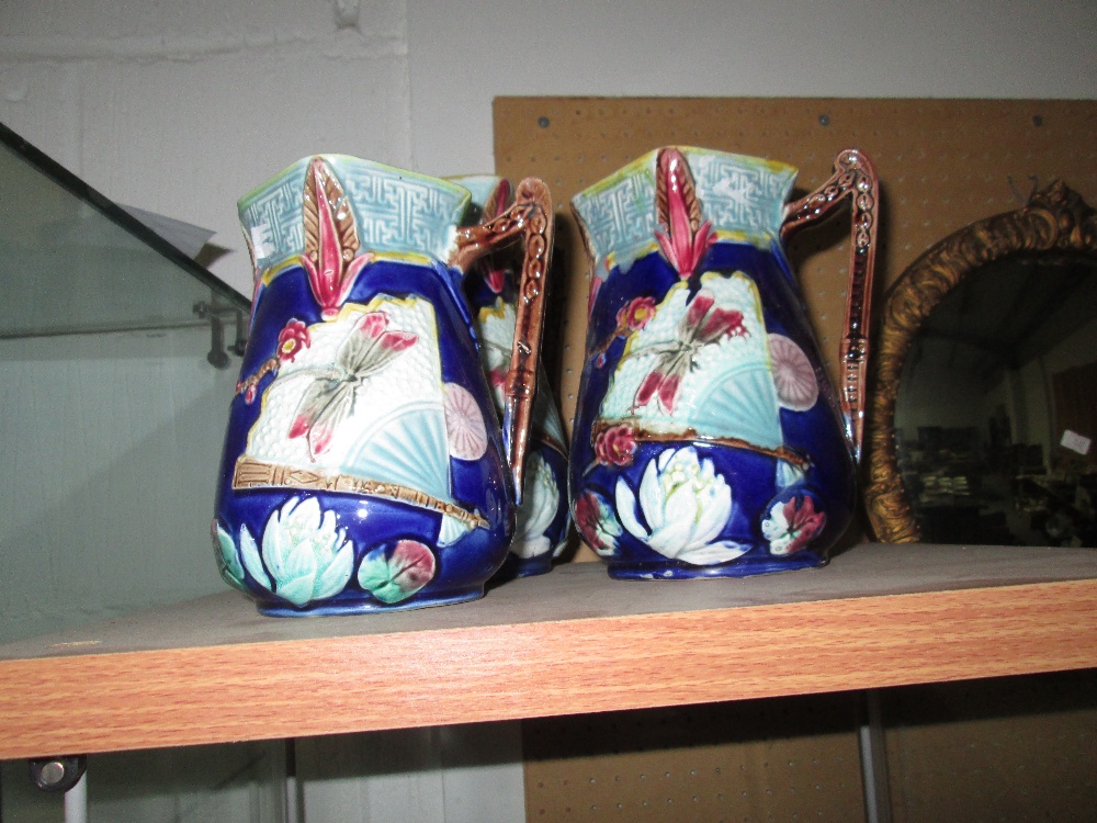 3 x late 19th / early 20th century majolica graduated jugs