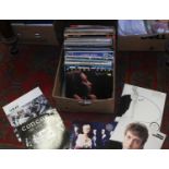 A box of records mostly rock and pop to include UB40, Dione Warwick, Lennon, Monkeys,