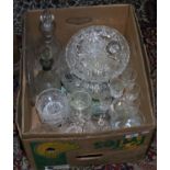 A box of cut glasswares including silver collared decanter, drinking vessel, vases,