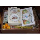 A box lot of dolls and Beatrix Potter to include dolls on stands and Beatrix Potter teaware.