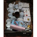A box of teawares to include flower decorated and boxed examples.