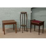 A two tier jardiniere stand, along with a piano stool and a mahogany sofa table.