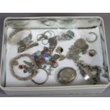 A collection of jewellery including silver examples a locket,