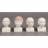 Four bisque china dolls heads, Healacraft and House of Nisbet.