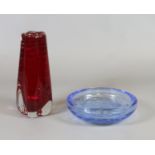 A ruby glass Whitefriars vase and a blue glass bowl both in the controlled bubble pattern.