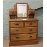 A Victorian satinwood dressing table.