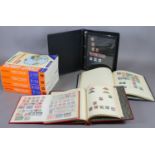 Four stamp albums and contents of British and world stamps along with volume 1-4 of Stanley Gibbons