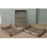 Three vintage wooden apple crates with stencilled lettering.