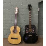 A K500 acoustic six string guitar with mother of pearl inlay and gloss black body along with a