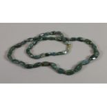 A moss agate necklace.