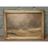 A C19th gilt framed watercolour coastal scene with a ship and a lighthouse on the cliff top.