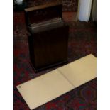 Four dining table pads in fitted twin handled box.