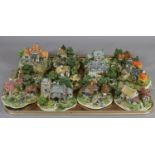 A tray of Danbury Mint composite models by Jane Hart from the country village collection.