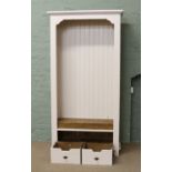 A John Lewis painted oak open bookcase with two drawer base.