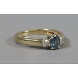 A 9ct gold Art Deco style ceylon sapphire and diamond ring size L.