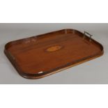 A mahogany serving tray with brass handles and a shell Patera.