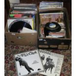 Two boxes containing a quantity of records to include musicals, pop, rock and roll etc.