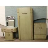 An Art Deco green limed oak three part bedroom suite comprising single wardrobe,