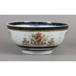 A C19th Sampson bowl after a Chinese armorial original with enamelled crest,