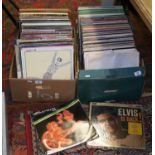 Two boxes of L.P records rock, pop and easy listening.