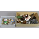 A box of costume jewellery and collectables and a box of badges.