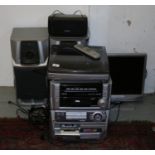 An Aiwa Z-HT530 digital audio system along with a Proline T.V monitor with built in DVD player.