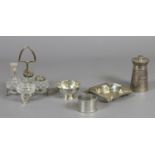 A quantity of silver items including a napkin ring, ashtray, pepper grinder,