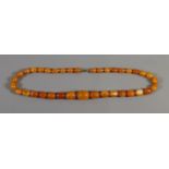 A string of butterscotch amber beads, 35 grams.