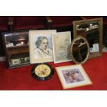 A quantity of framed watercolours and mirror along with a dried flower display.