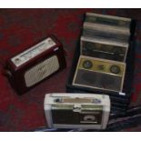 Five vintage transistor radios including R.G.D, Dynatron and Pye examples.