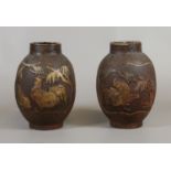 A pair of Japanese Meiji period ovoid earthenware vases with textured lacquer decoration and