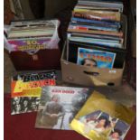 A box and record case containing a quantity of records, pop, rock, smooth etc.