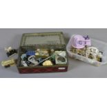 A tin of collectables and box of costume jewellery including carved ivory rose bud brooch,